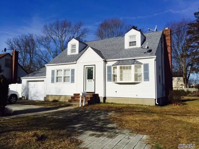 Beautiful Cape Style Home Facing South Oversized Back Yard Four Bedrooms And Two Full 1/2 Bath Baths Finished Basement