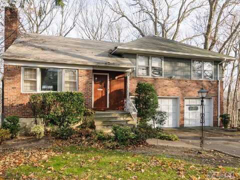 Immaculate 4/5 Bedroom Split Overlooking Hempstead Harbor In The Roslyn Pines Pool And Tennis Community.  The Home Offers A Cozy Living Room With A Fireplace, Spacious Formal Dining Room,A Fabulous Enclosed Porch And A Master Suite With A Sitting Area.