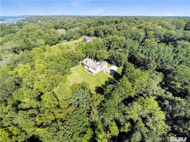 Beautiful Hampton Style Home On The Former Estate Of Madame Chiang Kai-Shek In Prestigious Lattingtown. The Home Is Located At The End Of A Half Mile Private Road And Sits On Over 6 Acres Of Park-Like Property Surround By Trees For Complete Privacy.