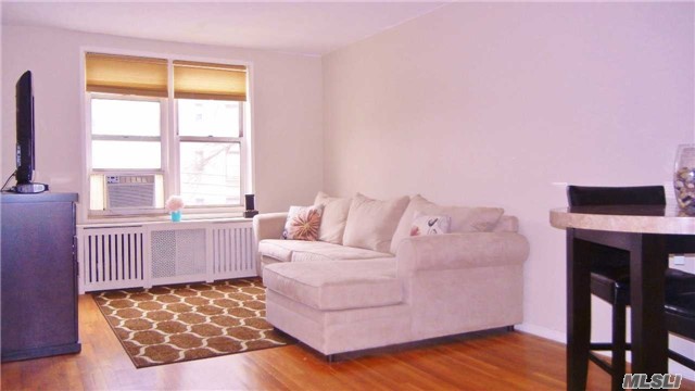 This Renovated One Bedroom Coop Features Hard Wood Flooring, Updated Kitchen With Stainless Steel Appliances, Updated Tile Bathroom, Spacious Bedroom, Four Closets. Centrally Located Within Two Blocks From Queens Blvd To F Line Subway, Buses, Shops, Dining & Supermarket. The Building Amenities Include A Laundry Room Indoor Parking (Waitlist) & Large Outdoor Courtyard.