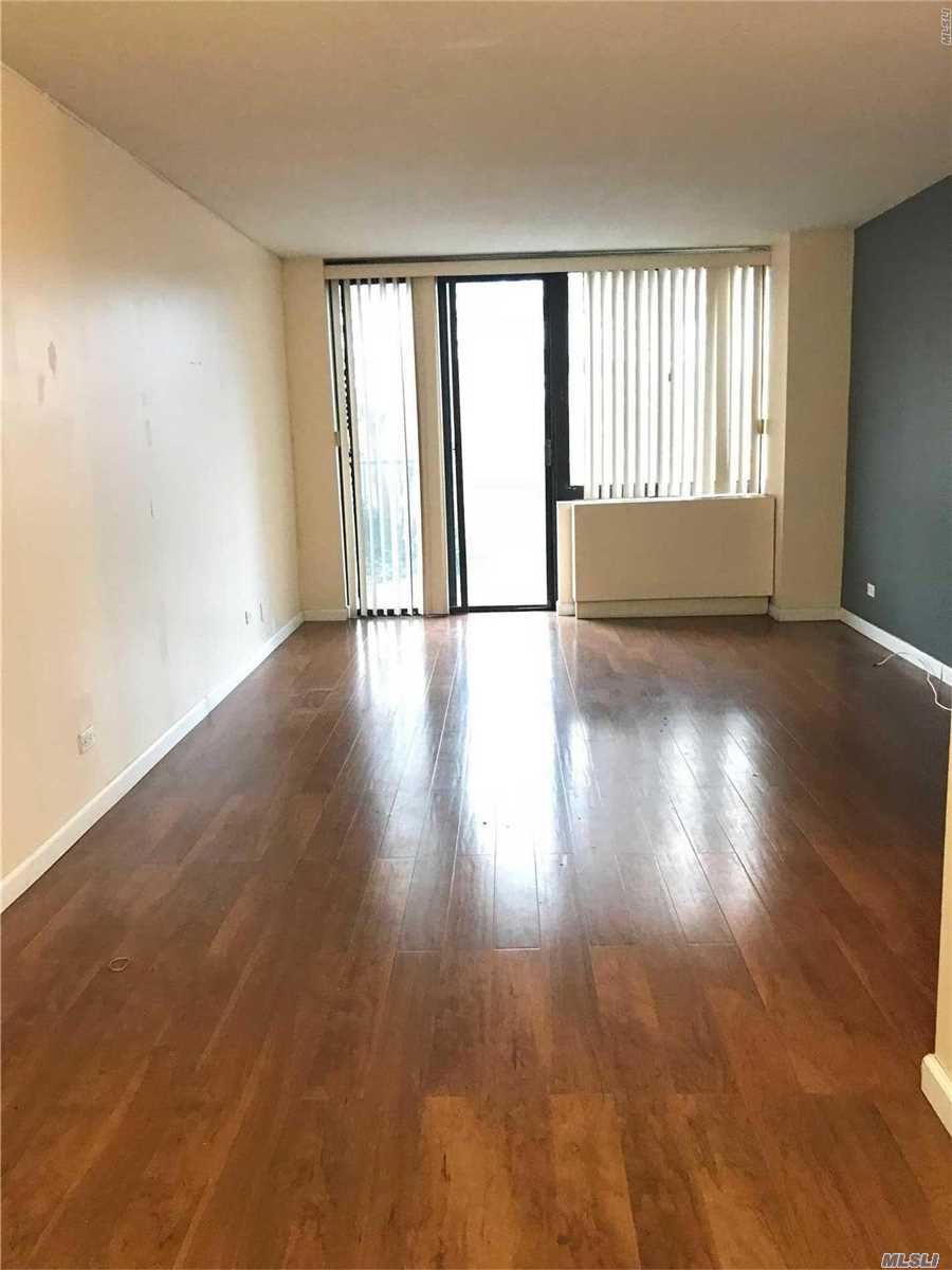 Spacious Two Bedrooms Apartment With Lots Of Natural Sun Lights. Located In 24 Hr Doorman Bldg In The Heart Of Flushing. Walking Distance To Main St With Shops & Rest & School Nearby. This Apartment Features Separate Kitchen, Hardwood Floors And An Elevated Patio/Garden With Views Of Parks. Currently An $155 Assessment Until Dec 2018. Five Minutes Walk To Subway Supermarket Restaurants , Doctor&rsquo;s Office Shops Banks Etc. Q25&Q34 Bus. Make Your Move Today!!