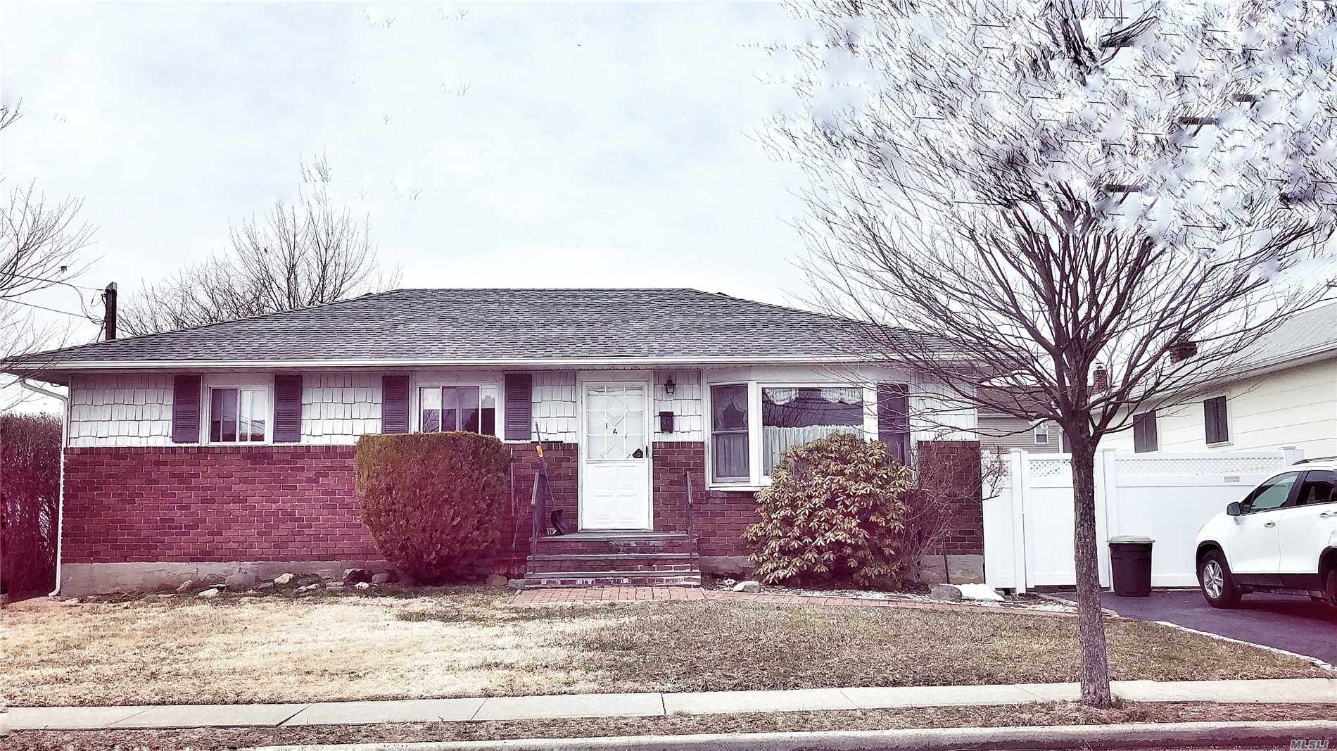 Charming Original 3 Bedroom, 2 Bathroom Ranch, Features A Large, Private Yard With Brick Walkway And Patio. The Basement Has A Private Entrance, Bathroom And Unofficial 4th Bedroom. Walk To The Lirr, Shopping, Community Park And High School. This Is A Great Opportunity To Update Into Your Own Special Home. Being Sold As Is By The Original Family.