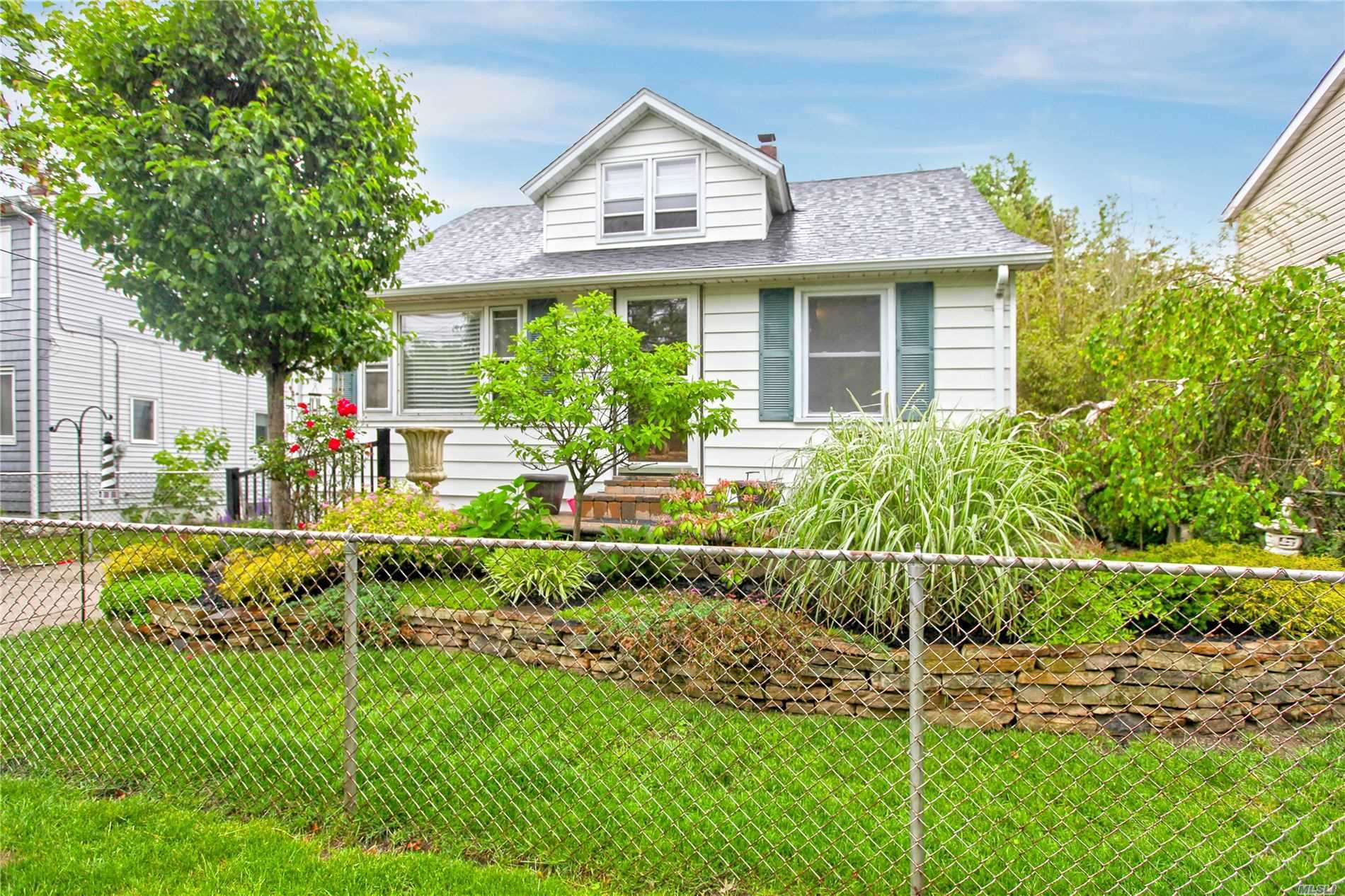 Potential galore in this 3 bedroom, 1 bath Cape with spacious back yard in an established neighborhood. This house has everything on your checklist. Generously sized rooms, large fenced back yard, 200 amp electric, detached garage with sub panel, full basement.