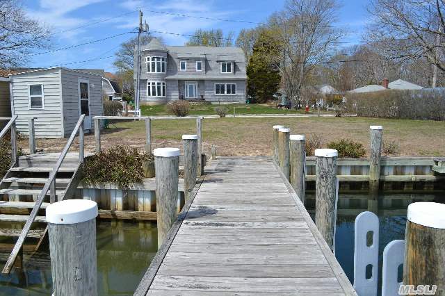 Splendid Custom Built Modern Colonial Home In One Of The Finest Beach And Boating Communities On The North Fork! Wonderful  Bay & Creek Views From Many Rooms. Includes A Separate Waterfront Lot,  Across The Street , With 75Ft Of Bulkhead And Docks With Room For 2 Boats And 3.5' Of Water At Mlt, Easy Access To Peconic Bay,  Private Beach Is Just Steps Away. Absolute Paradise!