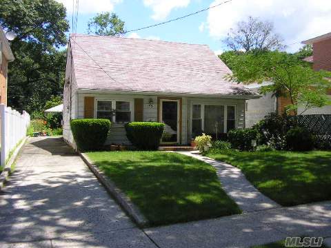 This Charming Detached One Family Is Located In Oakland Gardens Section Of Bayside. It Has Spacious Living Rm, Formal Dining Rm, Both With Hardwood Floors. There Is A Huge Eik, Family Rm , Bedroom & Bath On First Floor. Second Floor Has 2 Bedrooms & Full Bath. Sd #26 Within Walking Distance To Elementary School, Near Walking Path Of Alley Pond. New Sewer Connection.