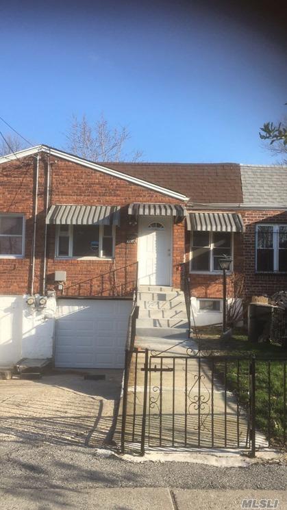 This Cozy House Is Located On A Quiet Block Of Linden Blvd. Just One Block Away From Restaurants, Delis, And Cvs Convenient Store. The House Is Built In Brick And Newly Renovated With An Attached Garage And Central Heating System. There Are Three Decent Size Rooms, Updated Open Kitchen And Brand New Bathroom With Skylight. Hardwood Floor Throughout The Entire House.