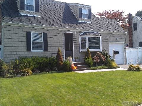 30Min Comute By Car To Qns Mins To Babylon&Ronk Lirr. Full Update In 08 Bay Window As Well As A Beautifully Designed Maint Free Composite Deck In 2012 Very Private Lg Backyard W/Vinyl Fence Upstairs Dedicated As Owners Retreat With Ample Storage And Full Bath W/Jacuzzi Tub Finished Basmnt Set Up As 2nd Living Rm W/4th Bdrm