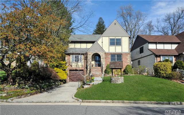 Solid Brick/Stucco Tudor On 50X124 Lot, Convenient To Town & Lirr. Generous Sized Rooms On All Levels, Inc. Stairs To Attic/Bonus Room. 1st Floor: Huge Eik, Fdr, Lr, Fr W/Fp, And Pr. 2nd Floor: Master Br W/Bath & 3 Br All With Generous Closets, Fbath. Ll: Large 1 Car Garage, Storage Rm, Finished Playroom, Laundry, & Utilities. Munsey Park E.S. Make This An Exception Value!