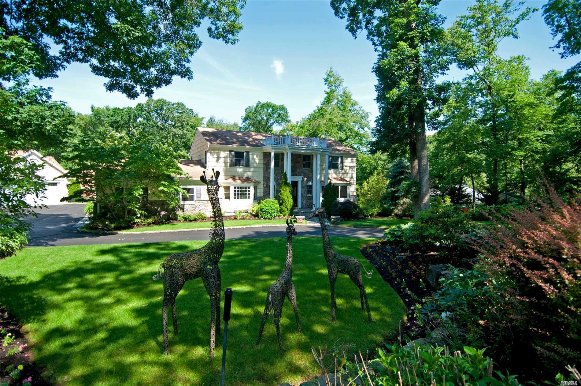 Pristine Center Hall Colonial On A Picture Perfect Cul-De Sac.Custom Granite 44&rsquo;X22&rsquo; Kitchen W/Panoramic Views Of The Yard & Deck.Wood Flrs.Master Bdrm W/Balcony Overlooking Yard, New Windows, & Propane Heat With 1, 000 Gallon Underground Tank.Ceramic Tile Finished Basement With Ose, Generator Hook Ups, 4 Bay Garage W/Heat, Electric, Central Vac, 2 Story Barn W/Electric.Must See!