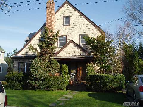 Warm & Welcoming Country Colonial In Great Location In Sd#14.This 3 Br Home Features An Entry Foyer, Lr W/Fpl, Fdr, Den, Eik, Library/Office & Fin Bsmt.The O/S Property Boasts A Large Bi-Level Deck.Hw Floors Throughout.Detached Garage.Near Transportation, Houses Of Worship & Elementary School. Taxes Do Not Reflect Star Deduction Of $1278