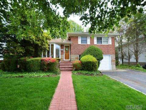 This House Is A Wow! Expanded Split In Mid Block Quiet Location! Large Family Room Off Kitchen! New Roof, New Walkway Pavers, Newly Paved Driveway, Nice Yard With Deck Off Den. This Is Truly A Unique Home.