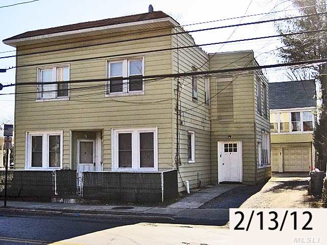 5 Family Residential Property 2 Seperat Buildings. Front Building Consist Of 4 Family Apartments, And A Full Basement. Rear Constuction Has 4 Garages And 1 Large 2 Bed Apartment On The 2nd Floor W/Seperate Heating System. Standing Attic.