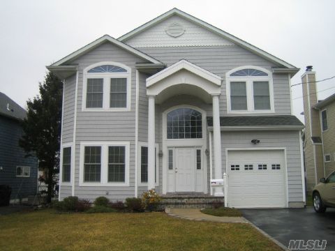 New 2006 Contemporary Colonial Offers Soaring 2 Story Entry, Lr, Fdr, Gourmet Granite Eik Opening To Family Room W/Fpl. Huge Mbr W/2 Walk-In Closets And Luxury Bath W/Whirlpool Tub, Separate Shower Stall. Beautifull Oak Floors Throught, Architectural Windows, Full Finished Basement, Large Rear Yard, And More!!