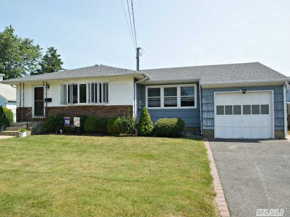 Updated And Well Maintained Expanded Ranch Home In Great Neighborhood Close To All Transportation And Excellent Schools.Featuring 4 Bdrms, 2.5 Baths, Beaut Fin Bsmt W/Summer Kit., Lge Property.