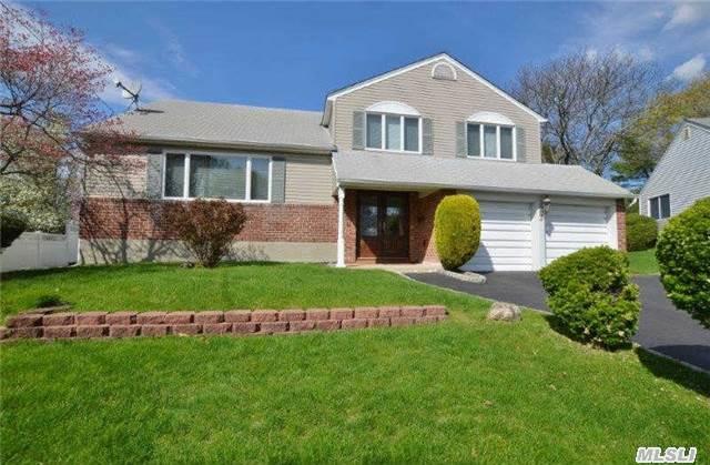 Pictures Coming......Spectacular Split In The Heart Of Syosset. Expanded Den With Fireplace! Four Bedrooms,  Master With Bath,  Gas Heating,  Cac,  In Ground Sprinklers,  Large Basement. Village Elementary.