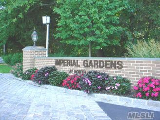 Luxury Imperial Gardens Condo  End Unit 3Br,2.5 Baths Pool&  Tennis Community At N Hills.  Liv+Dr+Den+Fp And Bar Updated Kitchen With Granite Counter Tops.  Hardwood, Marble Floors On First Floor.Spacious Master Bed+Oversized Marble Bath.   Close To Major Hwys And Miracle  Mile.