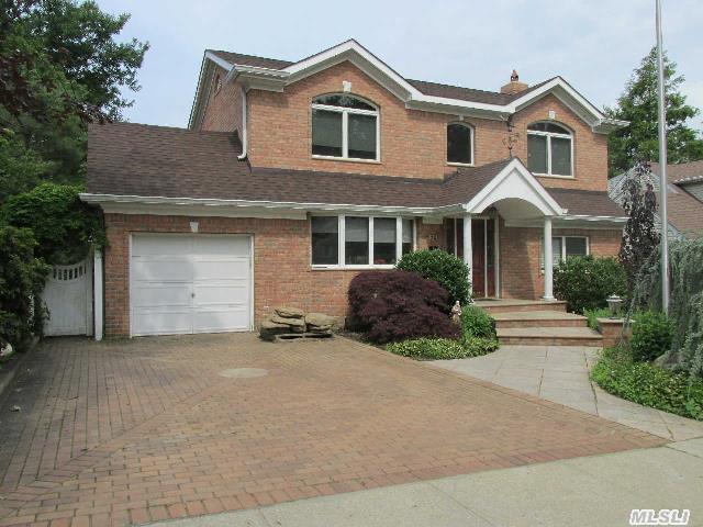 Open Floor Plan,  Beautiful Marble Floors Radiant Heat Floors,  Granite Counter Tops,  Cherry Wood Cabinets,  Wood Burning Fireplace, 5 Large Bedrooms,  2 Full Baths,  Full Finished Basement,  2 Zone Central Air,  Alarm System,  Updates To Electric,  Plumbing,  Windows,  Sewer,  Roof,  Pavers,  New Front & Rear Stoop,  Village Elementary,  South Woods Middle School,  Syosset High School