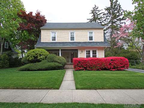 Welcome To This Front Porch Colonial In Pristine Condition. Quiet Mid Block Location Yet Close To Transportation And Shopping. Updated Kitchen With Granite Countertops,Updated Bathrms,Beautiful Hardwood Floors,Oversized 2 Car Garage.Parklike Property.Roslyn Schools.