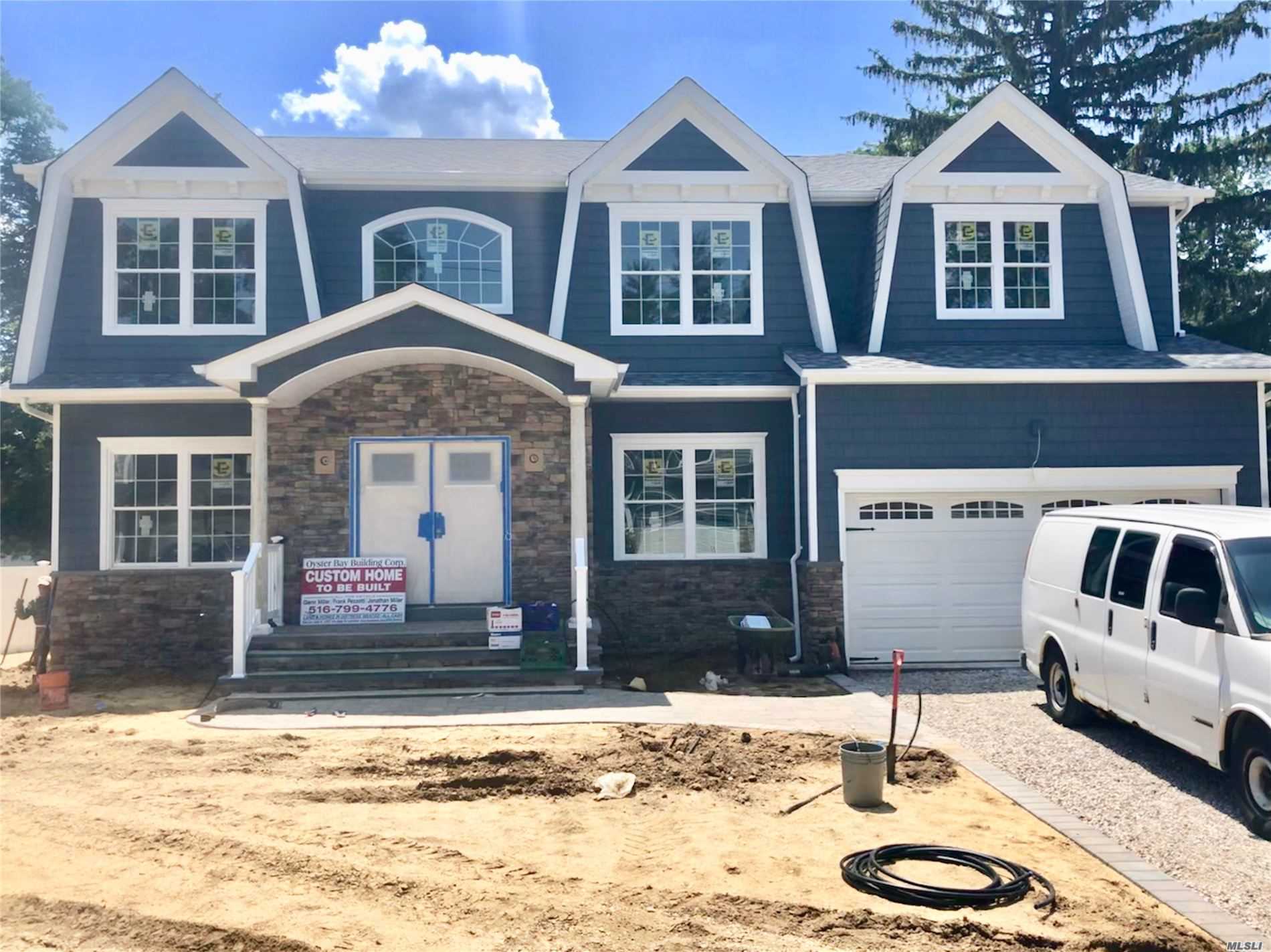 Home is about FINISHED In Heart Of Wantagh Woods (Oct. Completion)! Finished Photos Are Of Same Model Home Built By Same Quality Bldr Of 30+Yrs/400+Homes! Over 3600 SqFt Of Open Flr Plan Designed To PERFECTION & Built w/ Utmost QUALITY of Craftsmanship. CUSTOM Baths & Eat-In-Kit W/Top-Of-Line Appls, Walk-In Pantry, Pella Wdws, IMMACULATE Trim-Work Decorating Every SqFt, 1st Flr Jr Suite Or Office w/Private F-Bath, Add&rsquo;l H-Bath/Powder Rm On 1st Flr, Mstr Ste w/Giant W-I-C & Fbath+Jcuz, &MchMore!