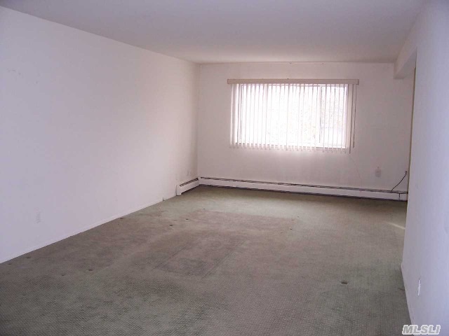 Oversized 2 Br,  2Bth Unit W/ Terrace And Pkg Spot.  Lots Of Closets.Laundry Rm On Floor.