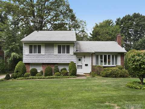 This Large Split Features, A Master Bedroom With Bath, 2 Additional Bedrooms And Hall Bath, An Entrance Foyer, Large Living Room W/ Fplc And Formal Dr. The Eat In Kit Leads To A Great Covered Porch Overlooking The Large  Backyard. A Ground Level Fam Room W/ 1/2 Bath, Also Overlooks The Yard. Home Has A 2 Car Gar., A Great Basement. Close To All. Nestled On A 85 X 197 Lot.