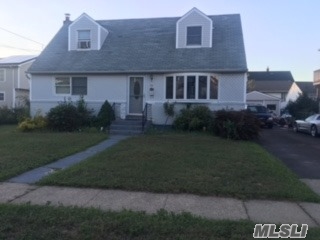 Four Bedroom Cape With 2 Full Baths. Detached Garage. Jericho Schools! Needs Some Tlc. Make It Your Own!