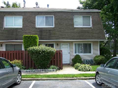 Sale May Be Subject To Term & Conditions Of An Offering Plan.Ready To Move In,Desireable End Unit,Newer Windows,Newer Appliances,Stackable Washer/Dryer,  Mstr.Bdrm. Has Custom California Closets,Patio For B.B.Q.,Commercial Parking,Sachem Schools,Low Taxes,Low Common Charges Must See.
