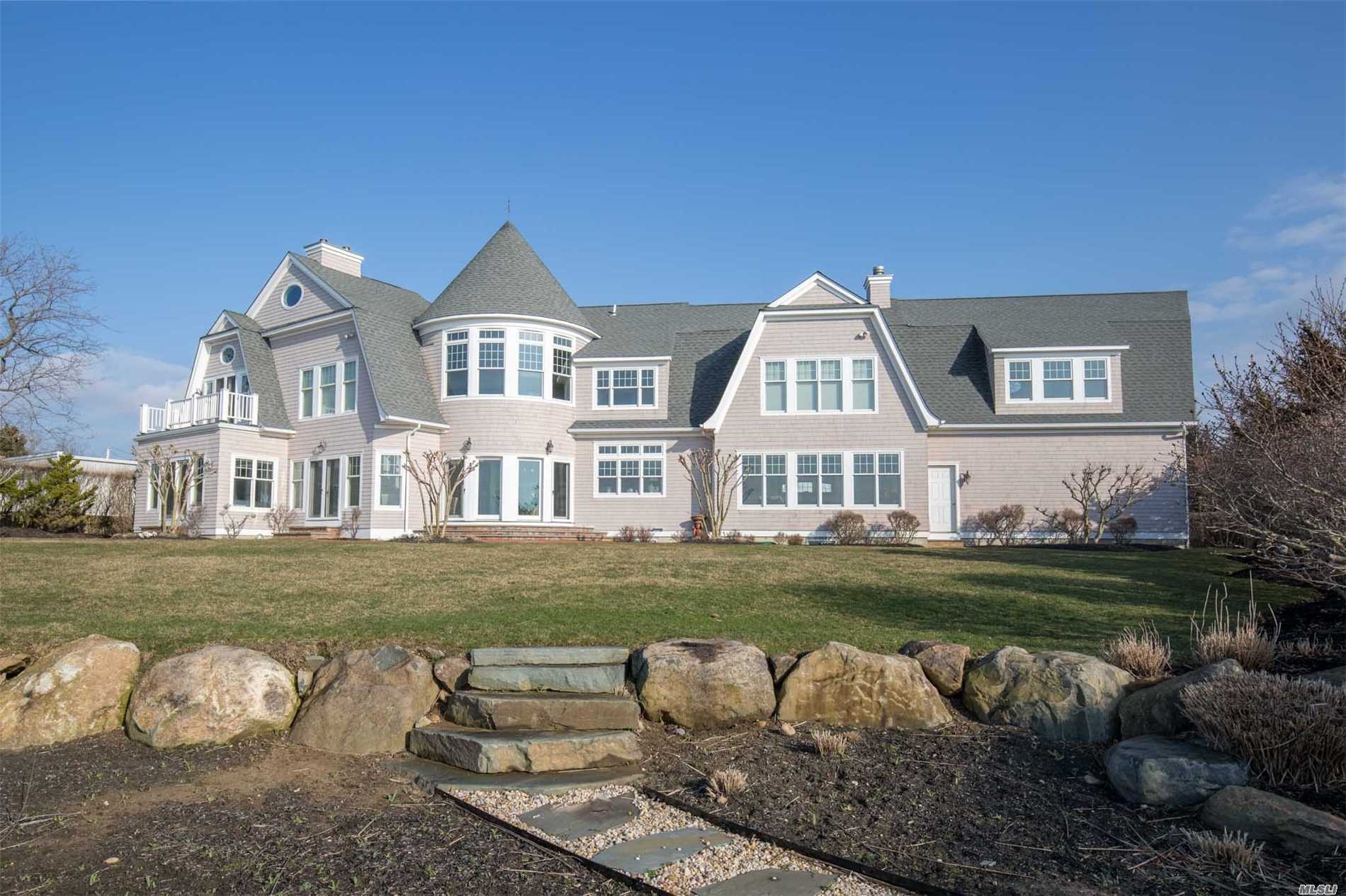 Spectacular Custom-Built Waterfront Home. Enjoy Sunsets Over The Long Island Sound And Take In Sweeping Water Views From Nearly Every Room. This 4 Bedrooms, 4 Bath Home Boasts A Chefs Kitchen, 3 Gas Burning Fireplaces, Brazilian Cherry Wood Floors, Hardwired With Surround Sound. Landscaped For Privacy And 170Ft Of Soundfrond Beach. Conveniently Located To Greenport&rsquo;s Many Restaurants And Shops.