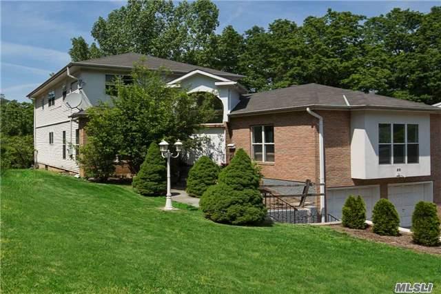 Beautiful Four Bedroom Home Located In The Lovely Village Of Great Neck. Each Well Planned Piece Of This Home Has A Unique Layout, Maximizing The Interior. The Wide Angled Entrance Features Inviting Contemporary Style Double Doors Opening Into The Home. A Sky-Lit Two Story Vaulted Ceiling Encompasses Majority Of The Interior Of The House. Groundfloor Master Suite.