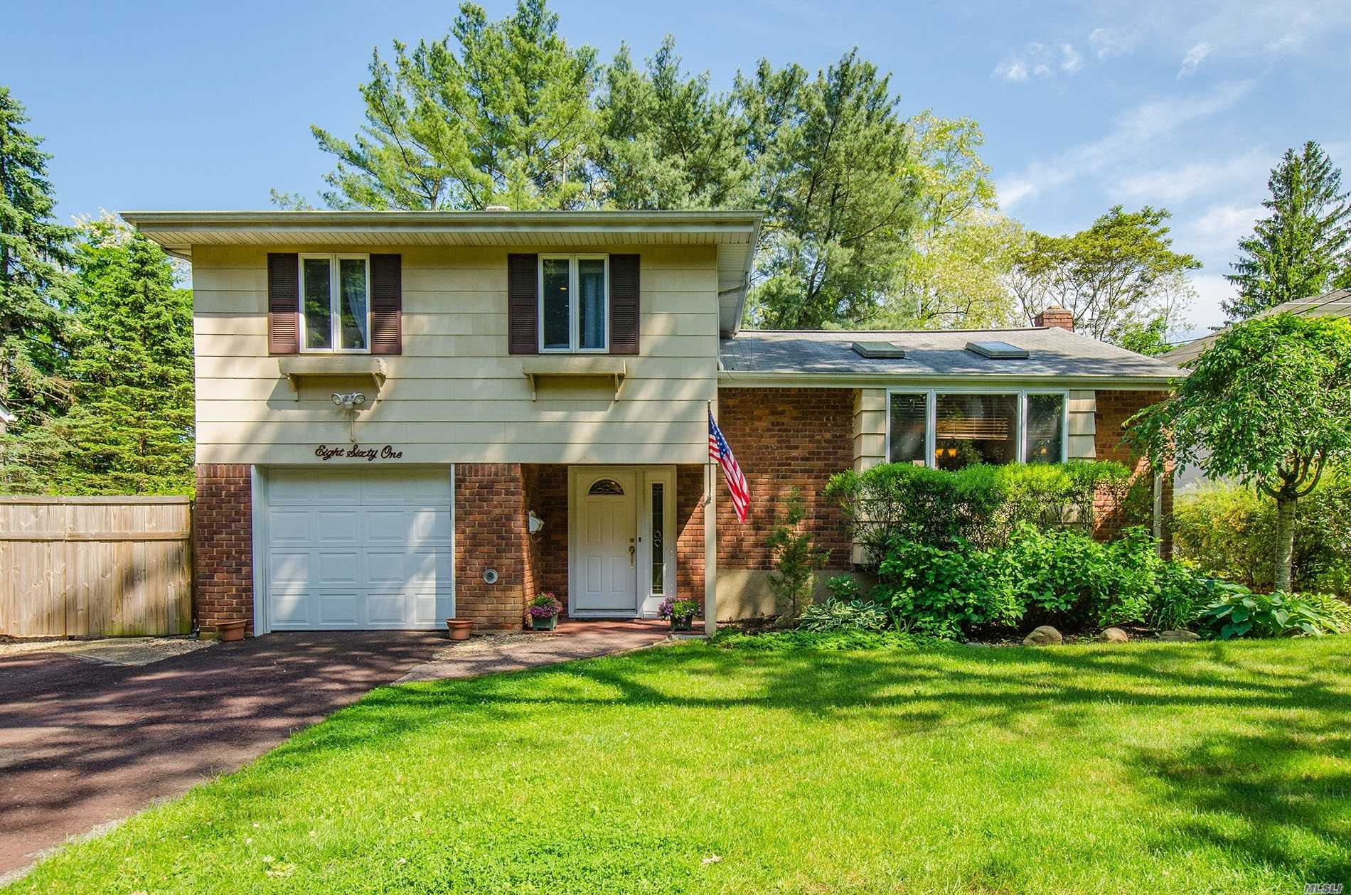 Completely Updated Split Level! Large Entry Foyer W/ Guest Bedroom And Bath. Beautiful Open Floor Plan W/Vaulted Ceiling And Hardwood Floors Throughout. Custom Eat In Kitchen W/ Granite Counters And French Doors Leading To Deck. Private Fenced Yard. Close To Town, Beaches And 25A. Must See!