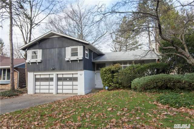 Desirable 4 Bedroom Split Level With 3 Full Baths, Wood Floors Throughout, Cac, Igs, In Close Proximity To Lirr (0.6 Miles) There Is A New Gas Heating Unit & Sep Hot Water Heater. The Rooms Are Oversized And Living Room Features Large Bay Window With Vaulted Ceiling. The Lower Level Has Been Completely Renovated. Wonderful Home! Buyer Needs To Verify All Listing Info.