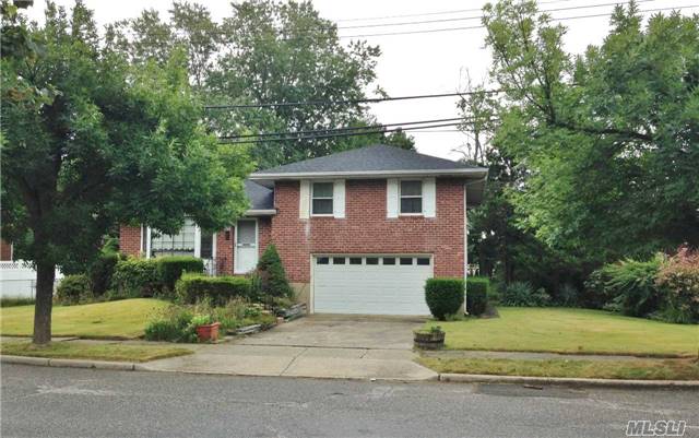 ***You'll Be So Sorry If You Miss This Opportunity-Spacious Brick Split W/Low Taxes, Updated Roof, Gas, 2-Car Garage/Driveway, Hw Floors, & Oversized Lushly Landscaped Yard Is Ready For Your Personal Touches/Updates On The Inside. Perfectly Situated Mid-Block On Quiet Street In Famed Syosset Schools & Super-Convenient To All In Jericho/Syosset. Buyer Must Verify All Info