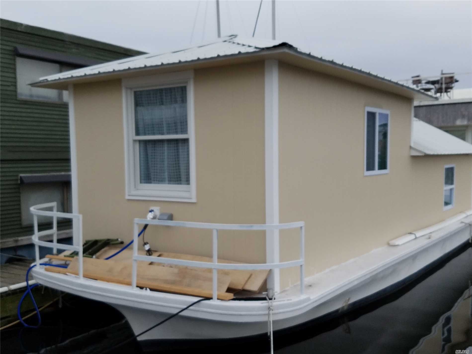 Newly Constructed 300 Sq/Ft Houseboat Built On 35&rsquo; Fiberglass Hull. No Engine. Can Be Towed To Other Marinas. Can Be Used Seasonally Or For Year Round Occupancy. Fully Insulated & Features Split Zone Heat Pump & 12, 000 Btu Ac. . Comes Fully Furnished W/Bed & Couch. New Kitchen Just Installed! Enjoy The Waterfront Life At A Cheap Price!