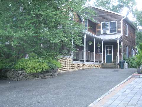 Bordering Kings Point In A Most Unusual Setting, This Custom Home Boasts 1/2 Acre Of Privacy! Enjoy A Hamptons Style Colonial With An Open Floor Plan, Featuring A Beamed Lr With Wdburng Stove, A Large Den, Dr Combo With Fireplace And Walls Of Glass Overlooking Rolling Lawn, And An Updated Kit With Stainless Appliances. Gn Park District, Pool, Tennis, Ice-Skating, Marina!