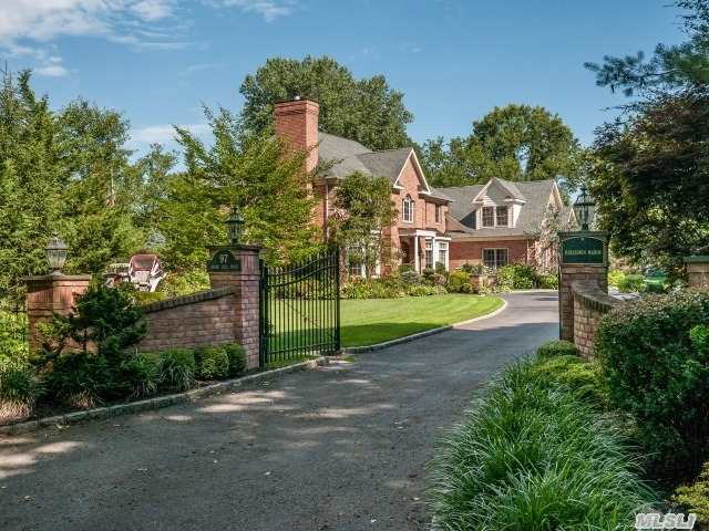 Enjoy This Pristine Gated Custom Blt Brick Colonial In Village Of Old West. Grand Entry Foyer, Detailed Moldings, Hardwood Thru Out, Chef's Eik, 2 Mag. Landscaped Resort Like Flat Acres.Complete Outdr Kitchen W. Fpl,  Pool+Hot Tub W. Waterfall, Koi Pond W. Waterfall, Surveillance Cameras Inside/Out.Generator.3 Car Garage, Extensive Outdoor Lighting.