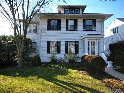 Stately Bell Court 4 Bedroom Colonial. Beautiful Corner Property Totaling Over 8700 Sq Ft. Gracious Entrance Foyer, 9 Ft Ceilings. Living Room With Fireplace. Banquet Sized Formal Dining Room With Built-In Corner Cabinet. Renovated Eat-In-Kitchen With Pantry. New Ceramic Tile Baths. 2nd Floor Has A Center Foyer & 4 Large Bedrooms. Sun Porch. Near Long Island Rail Road.