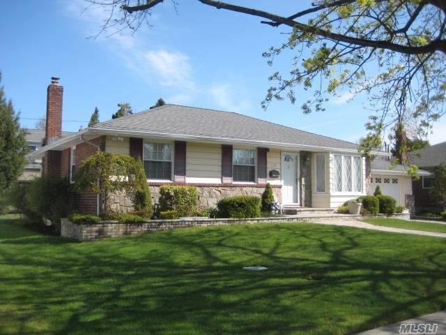 Charming Brick/Stone Ranch W/ Expanded Cozy Sunroom (Family Rm)  Southern Exposure Mid Block Location. New Brick Driveway & Front Steps. Updated Baths & Windows. Finished Bsmt W/ Plenty Of Closets & Storage Rms. Pull Down Attic. New Appliances. Generator. Beautiful Landscaping.