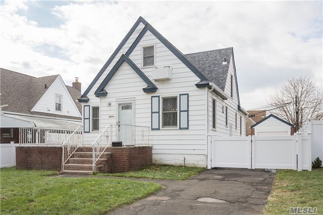 Charming Bayside Cape In Move In Condition Features Living Room, Dining Room, Updated Kitchen With High End Appliances, Two Full Updated Bathrooms, Full Finished Basement And Spacious Yard. Ps 159 & Is 025.