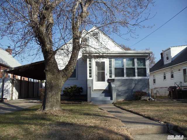 Lovely Renovated Cape Code Located On A Quiet & Peaceful Street,  Features Large Entrance Foyer,  Separate Canopied Basement Entry,  Car Port On Driveway To Side Entrance,  And Detached  Garage.  Conveniently Close To Schools,  Worships,  Shopping,  And Transportation.  Welcome To Your New Home!