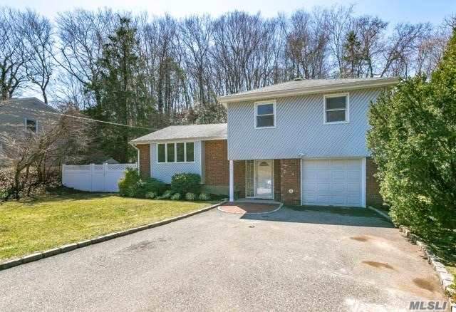 Sunny Spacious 4 Bedroom Contemporary Split. Open Floor Plan; Gas Fireplace; Den on Lower Level. Wonderful Private Backyard with Large Deck. Kitchen with New Stainless Steel Refrigerator Opens to DR. New Carpeting; Conveniently Located Near All.