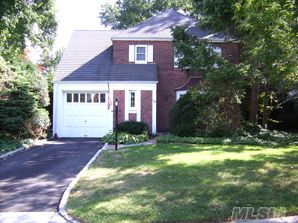 This Lovely Brick Colonial, Has Living Room With Fireplace, Formal Dining Room, Kitchen With Breakfast Room, Family Room With Fireplace, Partially Finished Basement, Covered Patio, New Roof, New Cesspool, 2 New Dry Wells, New Heating System, Easy Walk To Both Shopping And Railroad.And New Driveway ***Price Is Firm Not Negotiable***