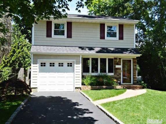 Beautifully Appointed Split Set On Park Like Property Overlooking The Golf Course.  Open Floor Plan With Updated Kitchen Featuring Granite Counters And Stainless Steel Appliances. Wood Floors And  Vaulted Ceiling Give This Split A Light And Airy Feeling. Renovated In 2009,  Upgrades Include Roof,  Siding And Stone Walk Way.