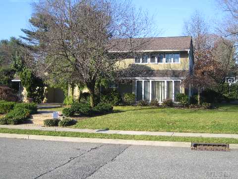 Beautifully Expanded Country Club Open Floor Plan Updated 5 Br On Quiet Mid-Block Location. Sweeping Circular Staircase To 2nd Floor.  Master Suite Includes Marble Bath With Double Sink, Huge Seperate Shower And 2 Person Jacuzzi. Central Vacuum, Alarm System,And Granite Fireplace.  Look Out From Your Living Room To A Professionally Landscaped Flat 1/3 Acre. Walk To Rr.