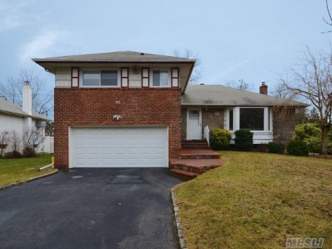 Updated Split On Tree Lined Street. 5 Year Old Eik With Silestone Countertops And Custom Cabinets. All Baths Updated, Newer Washer/Dryer. Home Was Reinsulated Within The Last 10 Years And Owners Have Low Heating Bills. 3 Zone Heat, 5 A/C Units, & Updated Windows And Doors. Fully Alarmed.  Baylis Elementary- Syosset Sd.Taxes Do Not Include $1336 Star Reduction.