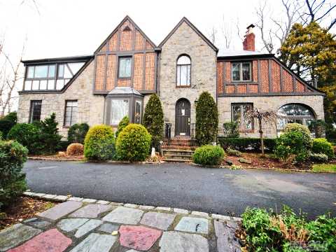 Beautiful Brick And Stone Tudor On Best Street In Harbor Hills. Majestic Street Presence And Gorgeous Waterviews. 4 Bedrooms Upstairs Plus Full Maids Suite In Finished Basement. Completely Renovated, Fully Alarmed, 2 Cac And 2 Heating Zones. In Ground Sprinklers. Community Private Pool And Tennis Club.