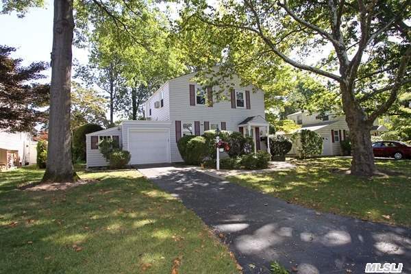 Charming Side Hall Colonial On Beautiful Tree Lined Street. Entrance Hall,  New Roof,  Inground Sprinkler,  Updated Baths,  New Kitchen Appliances,  New Windows, Mineola Schools,  Mid-Block Location. Great Outdoor Deck For Entertaining. Fireplace In Formal Living Room