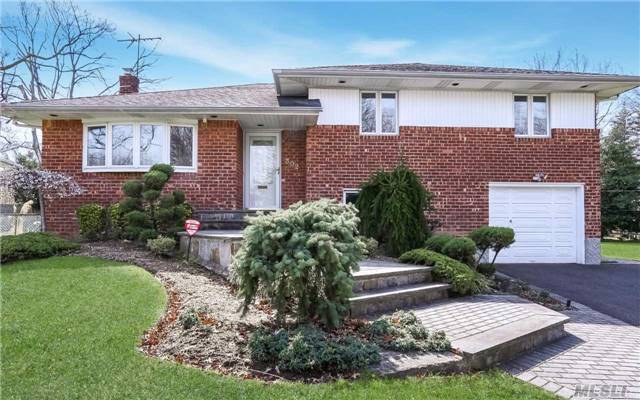 Beautiful, Expanded Brick Home With Open Floorplan. Light And Bright Glass Addition Off The Kitchen In Addition To A Wonderful Redwood Deck. Central Ac, Newer Roof, Newer Windows And Doors. Oversized Property With Screened Porch Off The Den. Convenient To Everything. All This And Famed Jericho Schools.