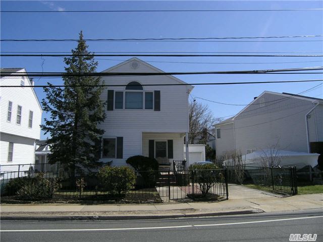 Just In Time For Summer.....Make This Adorable, And Very Sunlit Home All Yours. With Lovely Water~views Two Large Bedrooms, 2 Baths, Wood Floors On First Floor, Large Sunroom For Entertaining And Close To The Public Beach!