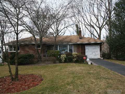 Sun Drenched 2 Br, 2 Bth Brick Ranch With Versatile Open Floor Plan. Renovated Eik, Large Lr With Bay Window & Fireplace Open To Formal Dining Room. Master Bedroom With Bath Plus Additional Bedroom And Bath. Screened Porch Overlooks Wooded Property. Full Bsement W/Outside Entrance. Cac, New Windows, Hw Floors. Close To Town & Train