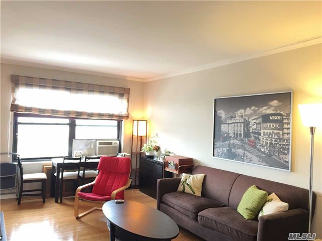 Wonderful 1Br Unit On High Floor W/ Incredible Views. Unit Has 4 Big Closets, High Ceilings, Big Windows, Bamboo Floor. Maintenance Includes All Utilities, Building Amenities, 24 Hours Security Guard / Doorman, And Newly Built Private Gym. Two Blocks From Train Station, Close To Schools, Prime Shopping Centers, Rego Mall And Restaurants.